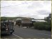 Main street of Toora with windmills in the background